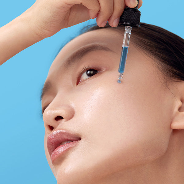 Applying a serum with a dropper — how to layer actives and sunscreen without pilling or irritation