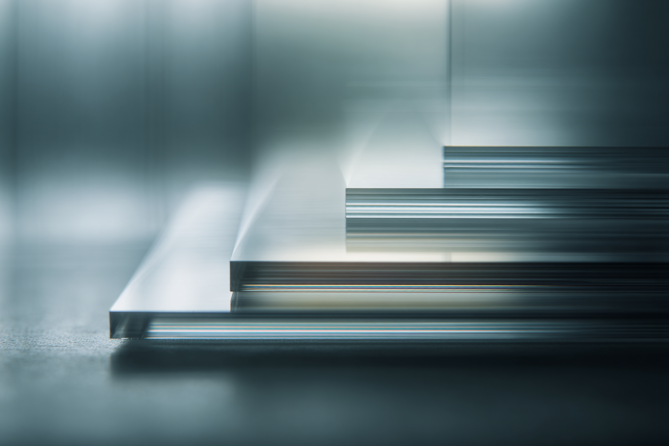 Layered translucent glass sheets in cool light