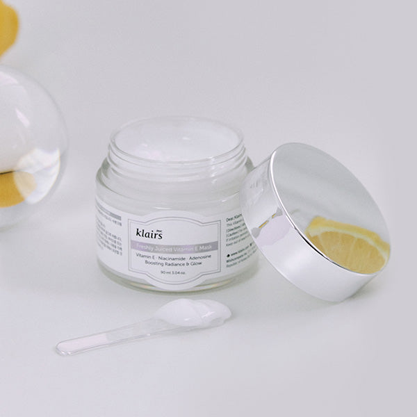 Freshly Juiced Vitamin E Mask jar with spatula and plush cream texture