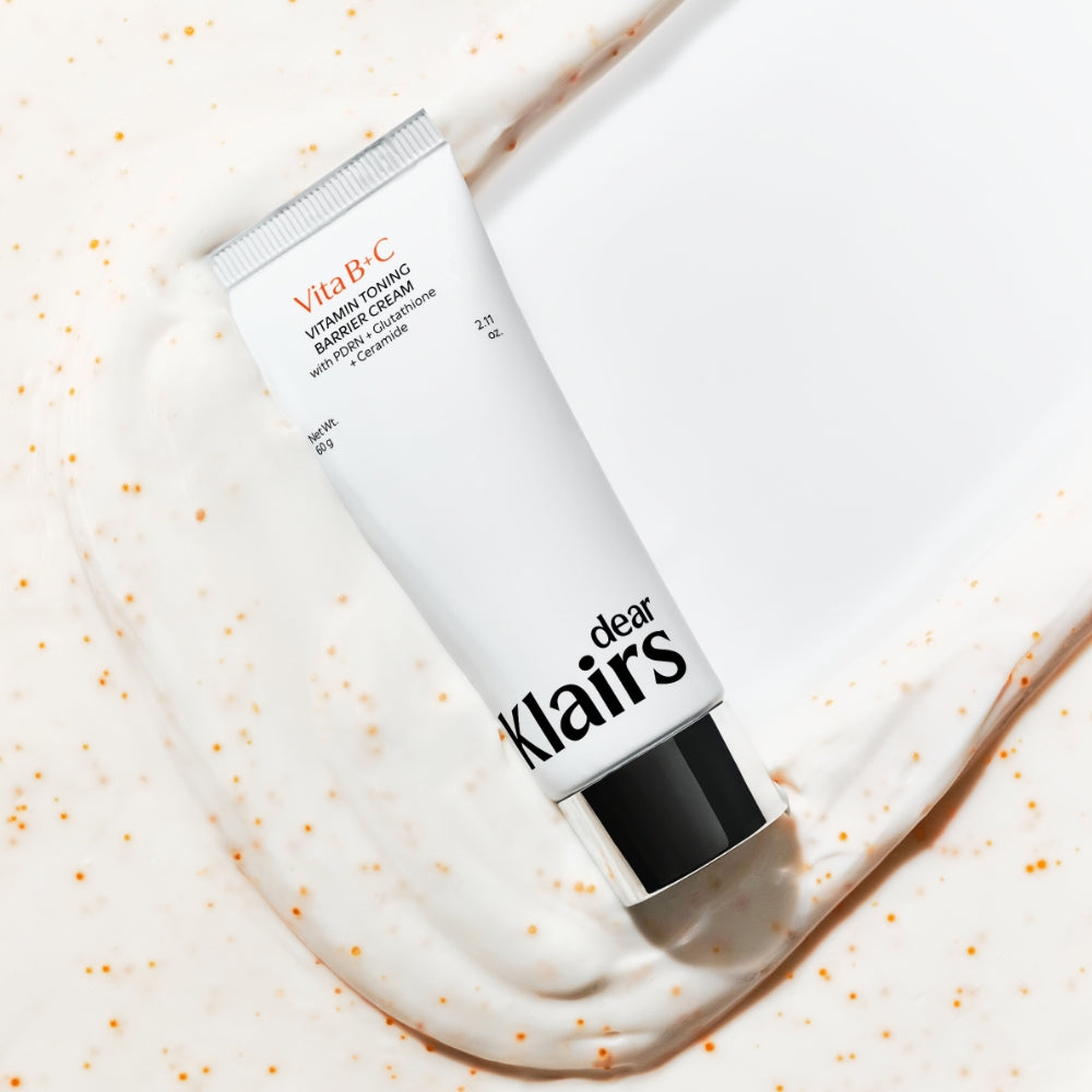 Vitamin Toning Barrier Cream tube with cream texture and vitamin-toned speckles