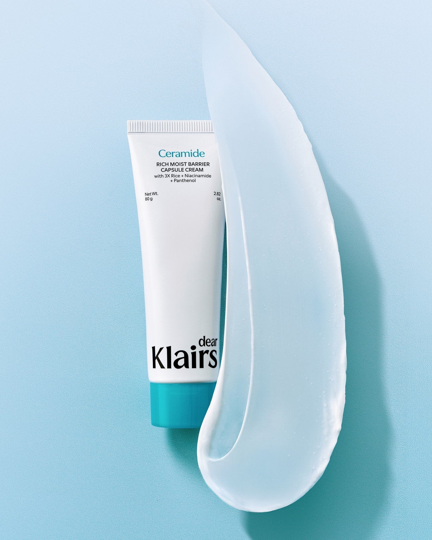 Rich Moist Barrier Capsule Cream with cream texture scoop